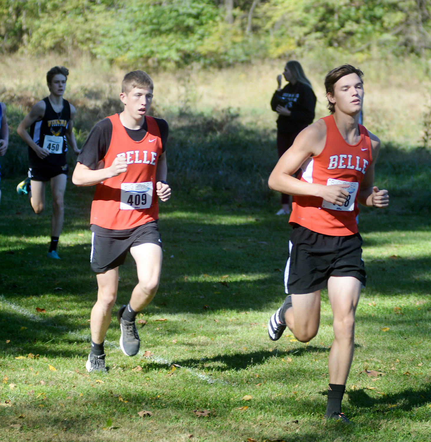 Baylar Smith and Corey McDaniel (from left) run together in the early stages of the varsity boys race Friday during the Gasconade Valley Conference (GVC) Cross Country meet in Steelville.